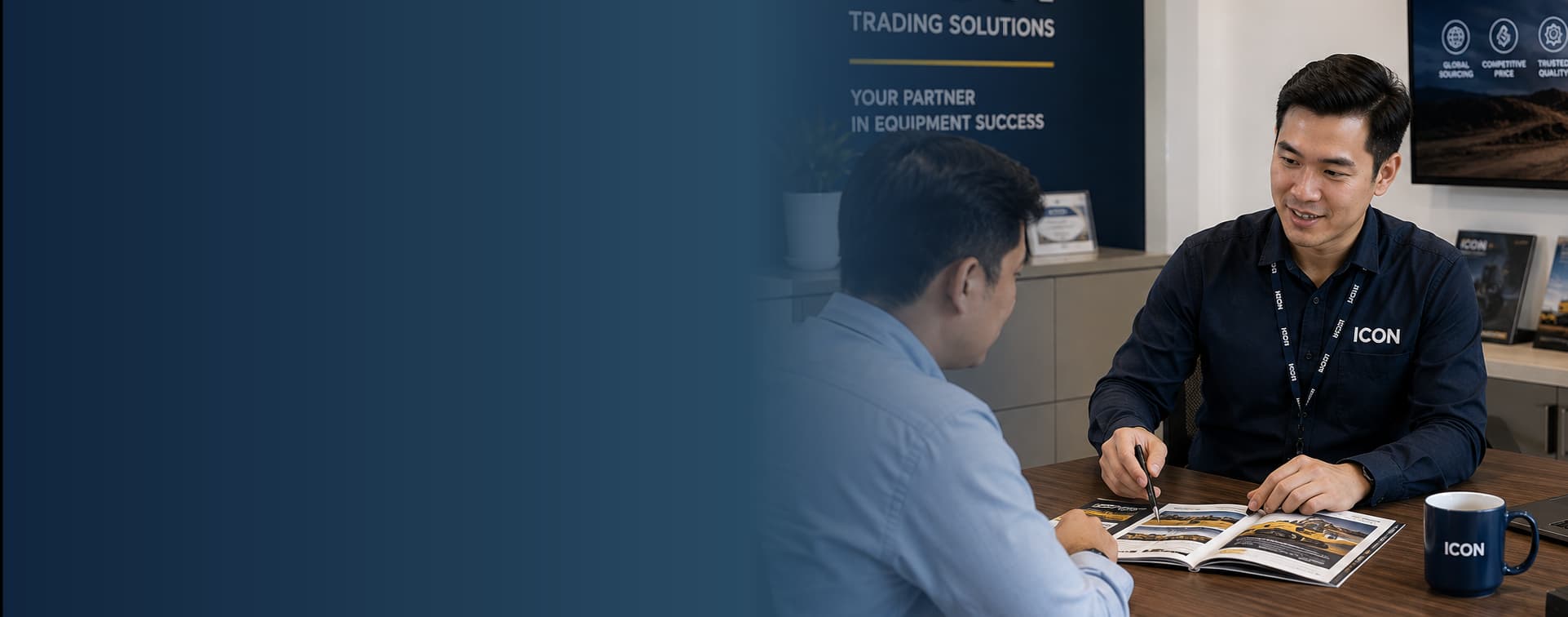 ICON trading consultant reviewing the equipment catalog with a client